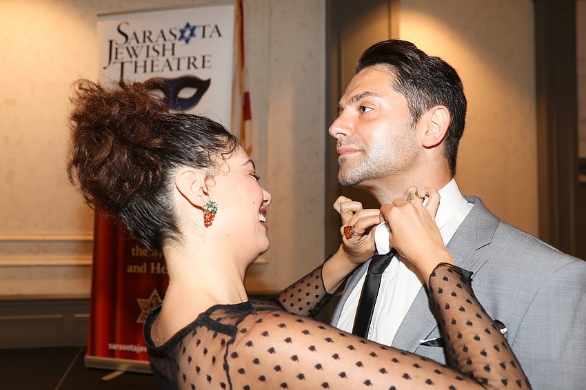 NYC actors Josephine Phoenix and Michael Raver, who are in the current play, get ready for the luncheon honoring Nancy Roucher.
