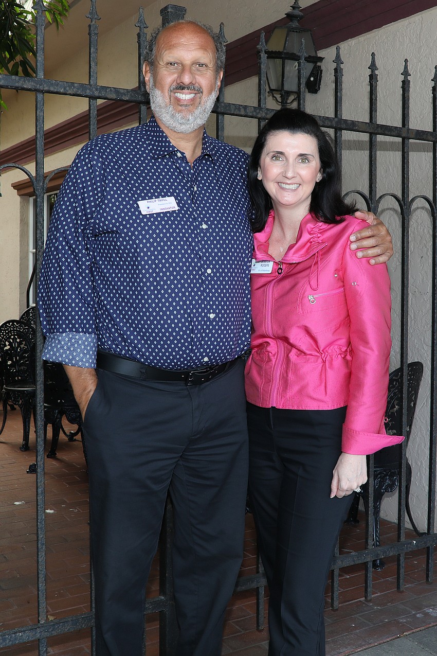 Showing support from Children's First are Philip Tavill and Jessica Rogers.