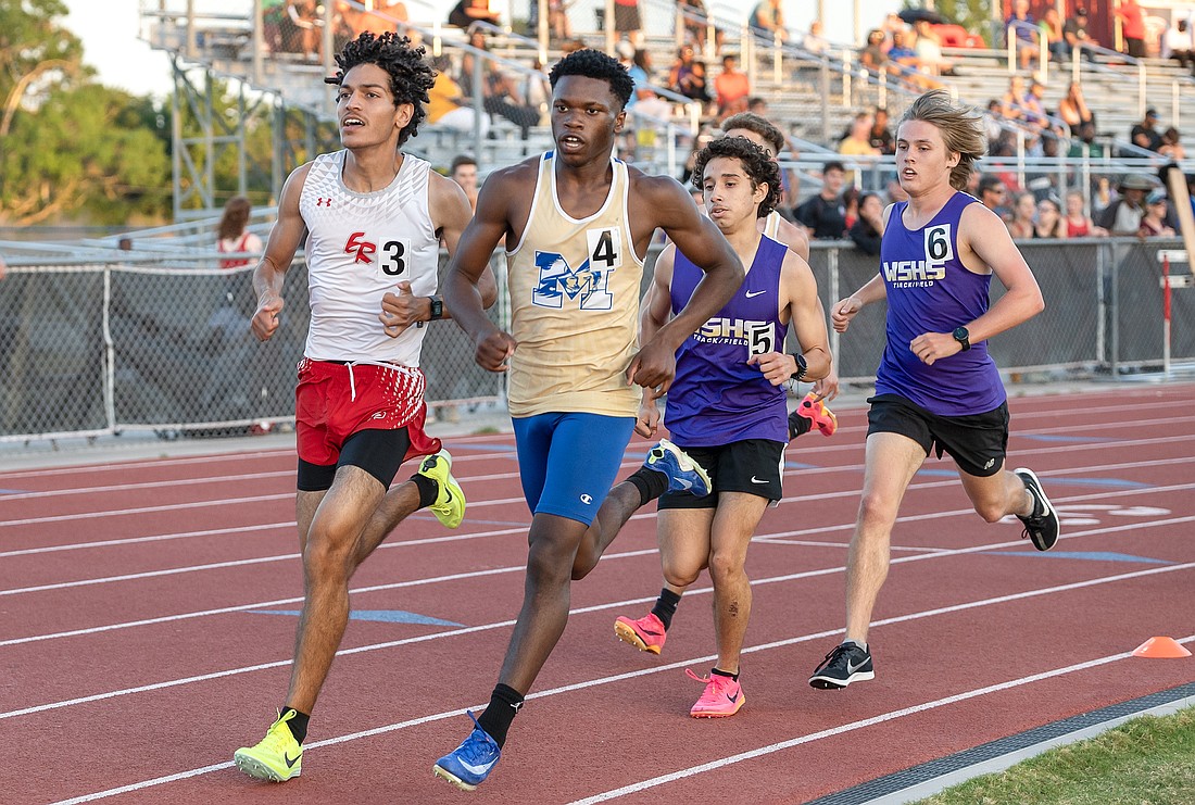 Mainland's Kajuan Curry (4), here running in the 800 at last year's district meet, won the 800 again in 2025 at the District 6-3A meet on April 25. File photo by Michele Meyers