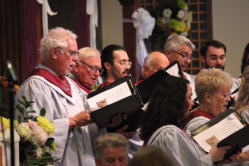 The choir sang Easter-themed hymns at the first musical event at St. Armands Key Lutheran Church to feature a special guest playing the new pipe organ.