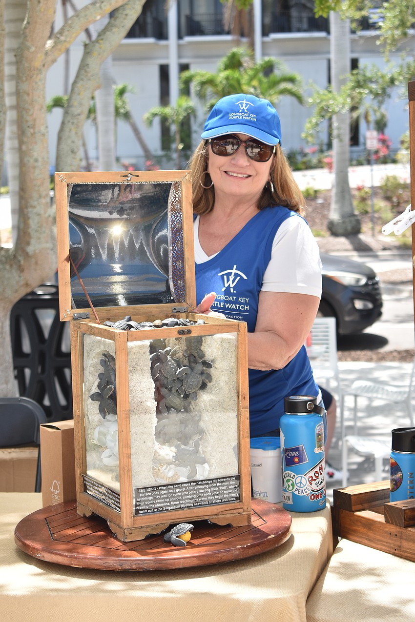 Vicki Marinangel of Longboat Key Turtle Watch showcases a model of a turtle nest.