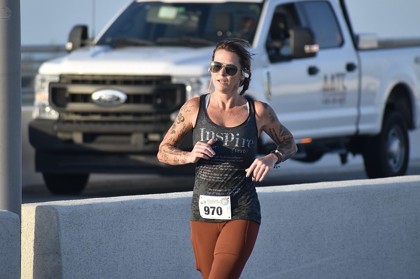 Claire Stirling heads back across the bridge.