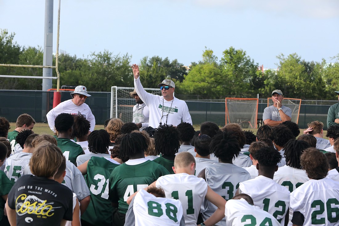 New FPC football coach Patrick Turner talks to his team. Photo by Brent Woronoff