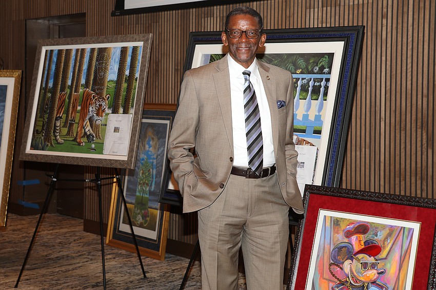 Famed artist René Dickerson worked on a special Mickey Mouse painting with the VMA students.