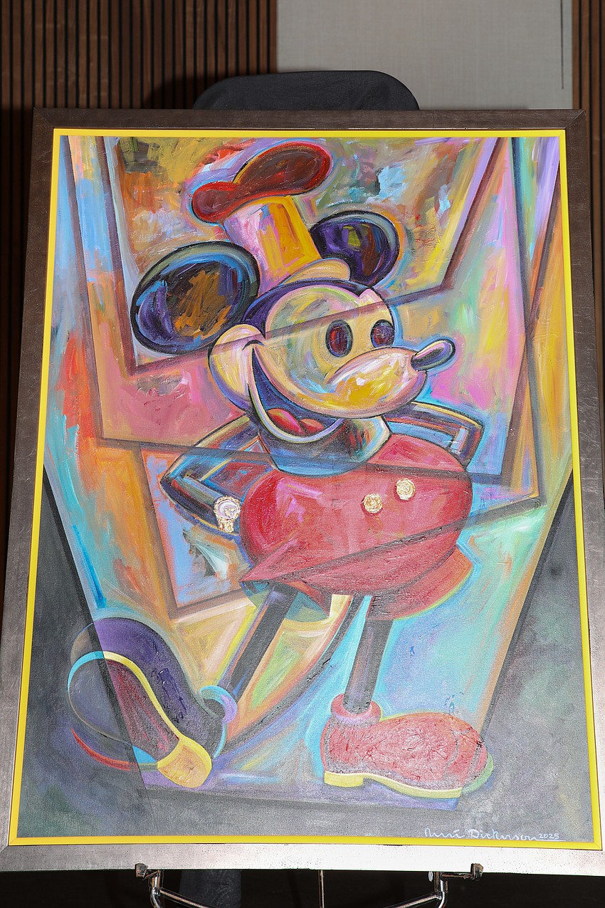 Famed artist René Dickerson worked on a special Mickey Mouse painting with the VMA students that was auctioned at the Shine On gala.