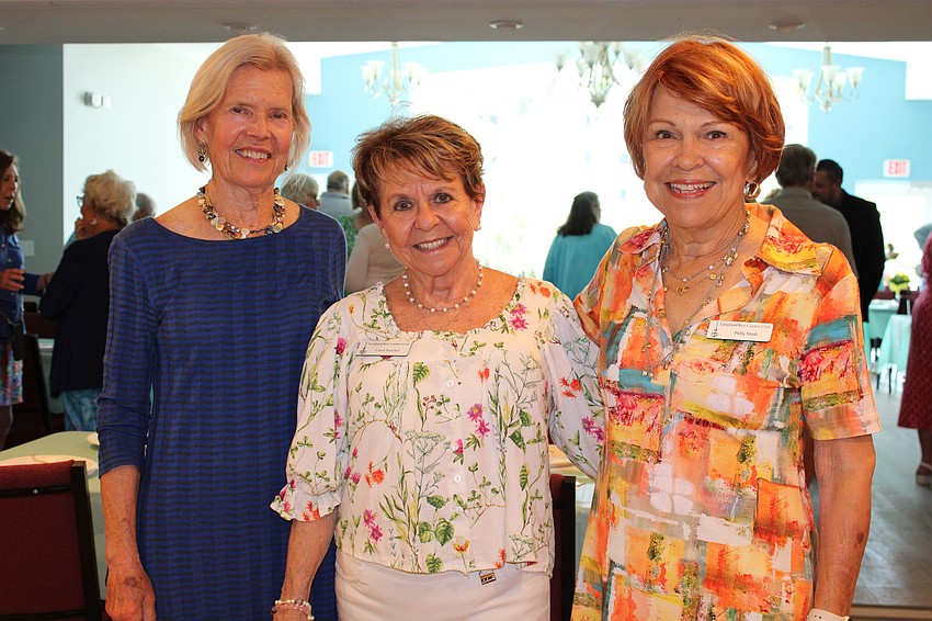 Debbi Wilson, Carol Peschel and Polly Stark join the Arbor Day festivities.