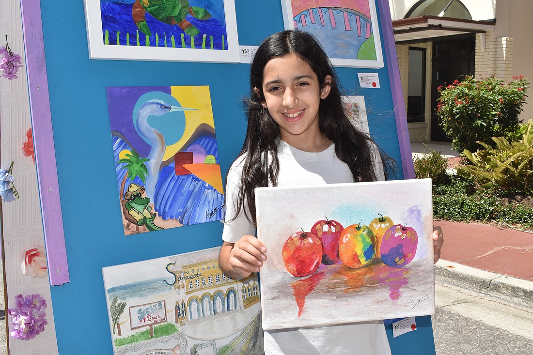 Maria Swirczyuski, 10 showcases her artwork from Lina Rincon Art Studio. She also created the painting of the heron to the left.