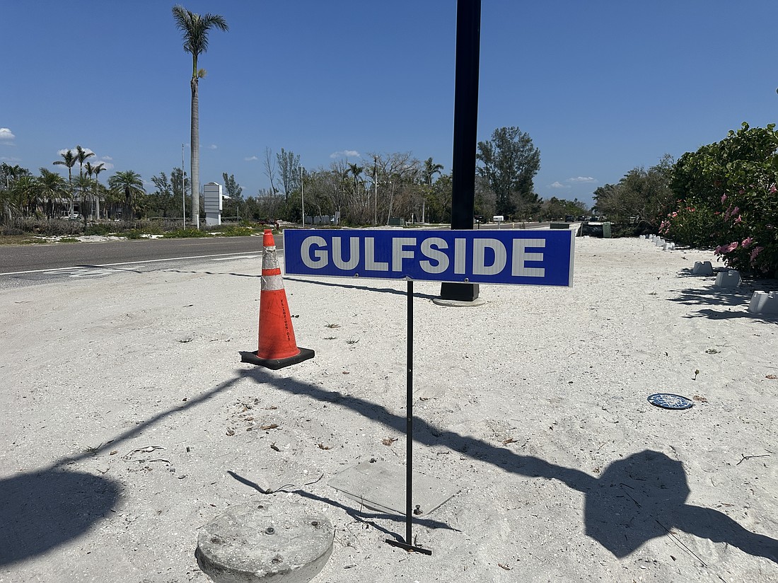 Temporary street signs will soon be replaced with new backlit street signs along Gulf of Mexico Drive.