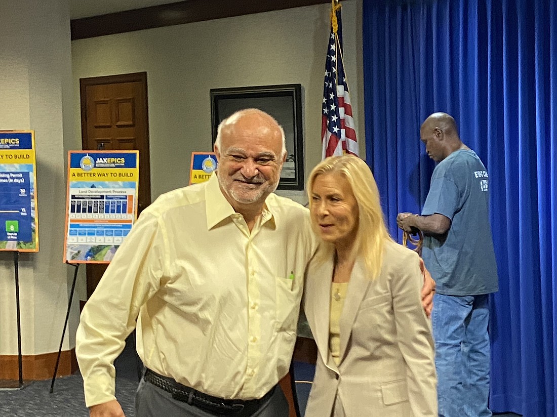 Developer Toney Sleiman and Jacksonville Mayor Donna Deegan at the May 1 announcement of an eight-point plan to streamline the city's civil plan review and permitting process.