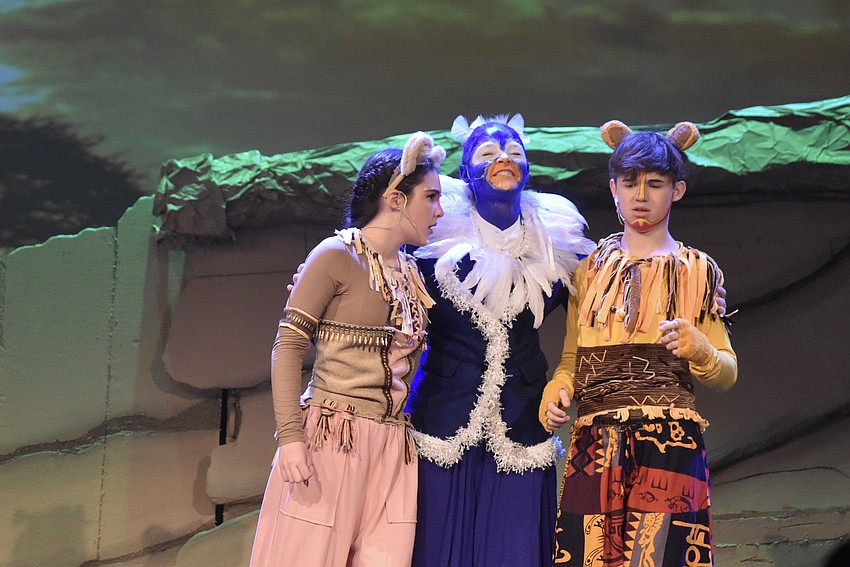 Alexandra Mahiquez, Courtney Thompson and Chance Horvath star in The Lion King Jr. at the Woodland Fine Arts Academy May 2.