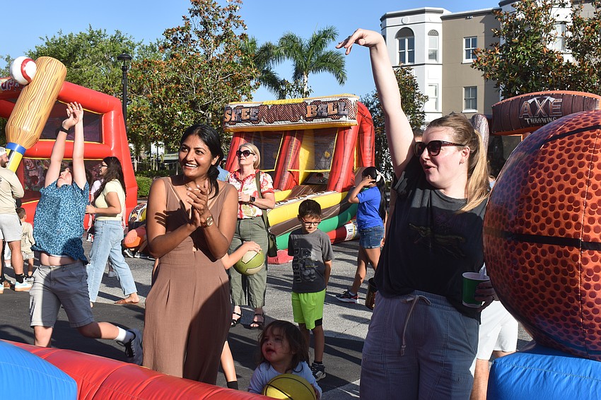 Sarasota resident Kavita Tisdale and Denver, Colorado resident Trish Slevin met in college and enjoy a Friday night excursion to Lakewood Main Street.