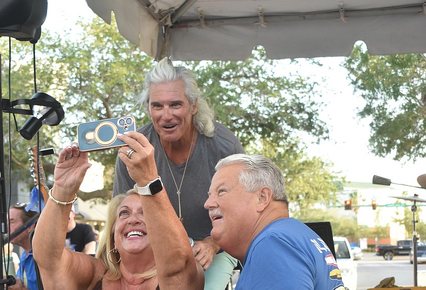 Lakewood Ranch residents Pat and Dave Trehy are retirees from New York who have been married for 35 years. Pat Trehy said they have seen Bluestar six times and wanted to strike a pose with Kevin O'Connor.
