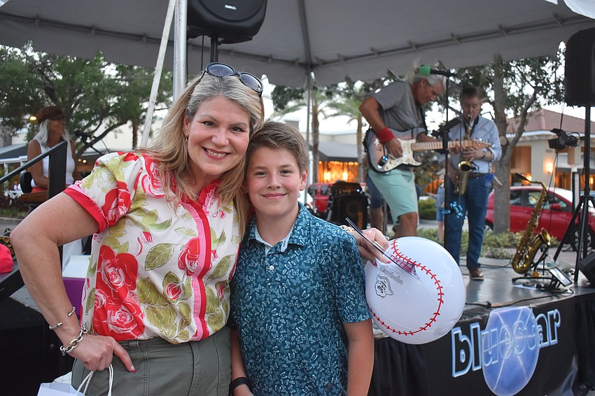 Lakewood Ranch residents Stephanie Almasy and her 9-year-old son Andrew came out to enjoy the blues music. Andrew enjoys dancing and attempted to do the moonwalk like Michael Jackson, but claimed it is impossible.