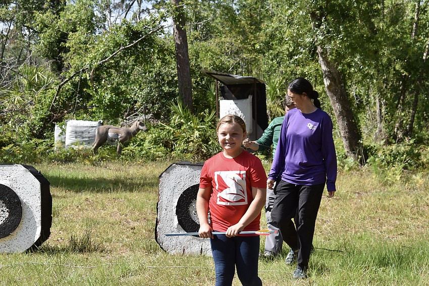 Maya Christian, 8, is happy to be old enough for archery. She was too young the last time she attended with her big brother.