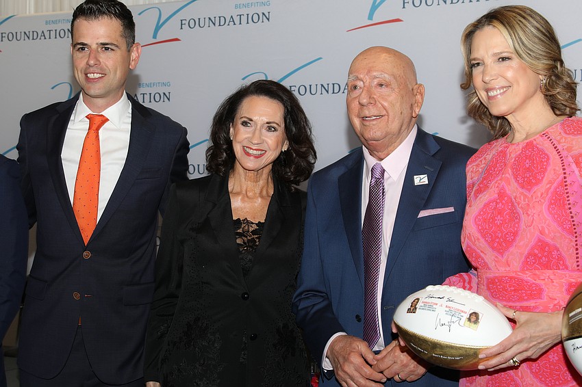 UF basketball coach Todd Golden, event planner Mary Kenealy, basketball sportscaster Dick Vitale and Hannah Storm, who takes home the John Saunders Courage Award.