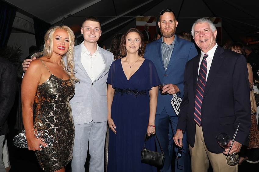 Kimberly, Bryce, Carrie and Jeremy Jackson with Yvan Kelly