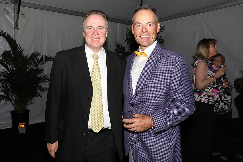 Pat Fisher and Michael Wiggins are both parents of children who are members of Dick's All-Courageous Team.