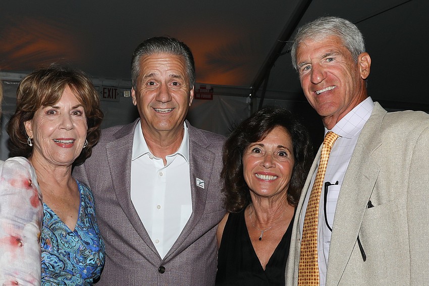 Lorraine Vitale and Arkansas head coach John Calipari with Annie Alleva and husband, Joe, who is the LSU chancellor and director of athletics.