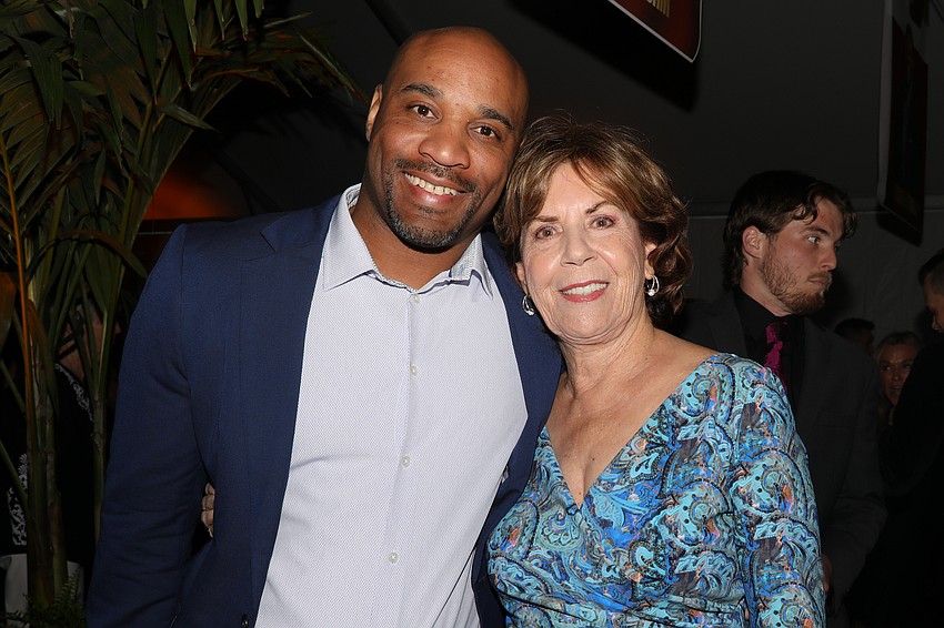 Former Notre Dame running back Ray Herring with Lorraine Vitale.