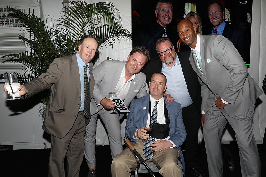 Jerry McLaughlin, Phil Pilewski, Ryan Donoghue, Brian Barthmaier and Jerod Ward show some love for each other.