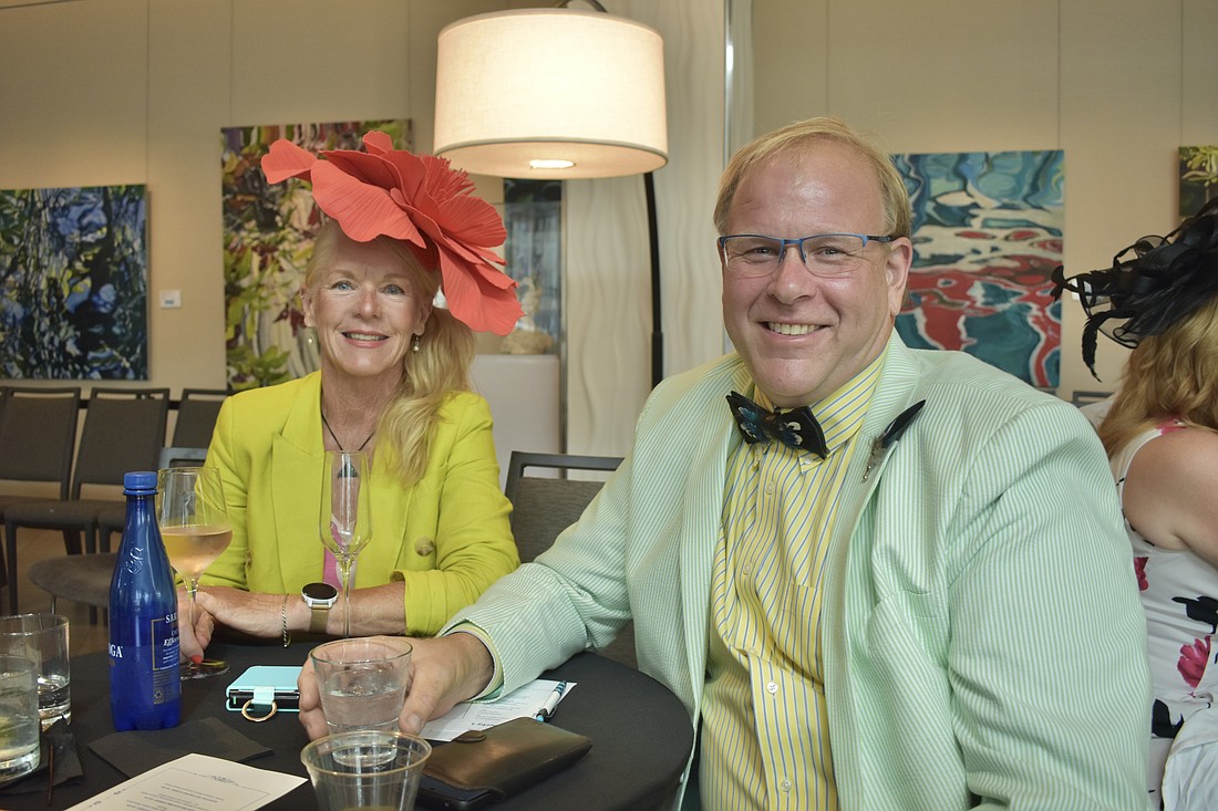 Karen Hall and her partner Paul Voloshen watch the musical performance.
