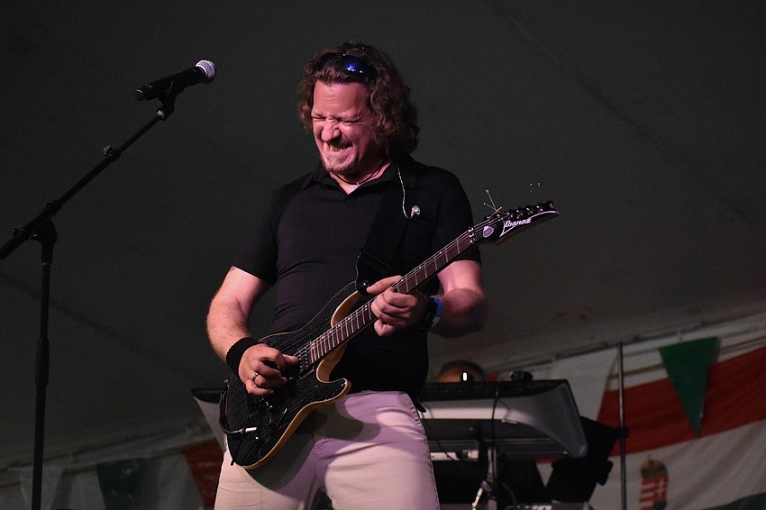 Hungarian musician Tamás Kontor offers a performance.