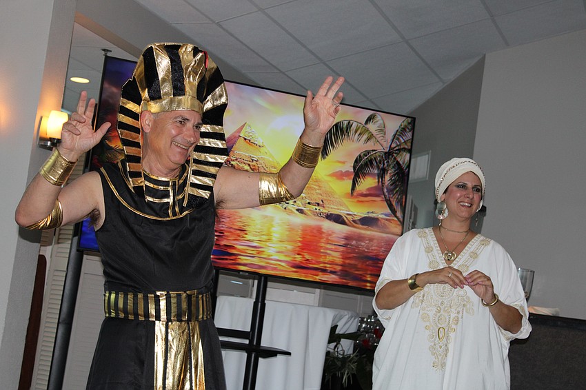 Joe Cartelli and Rhonda Daniels show off their moves on the dance floor at FemCity's latest Egyptian-themed fundraiser for Teen Court.
