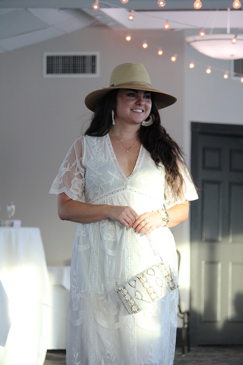 Victoria Konsavage models an etherial look at the FemCity Egyptian Night fashion show fundraiser for Teen Court.