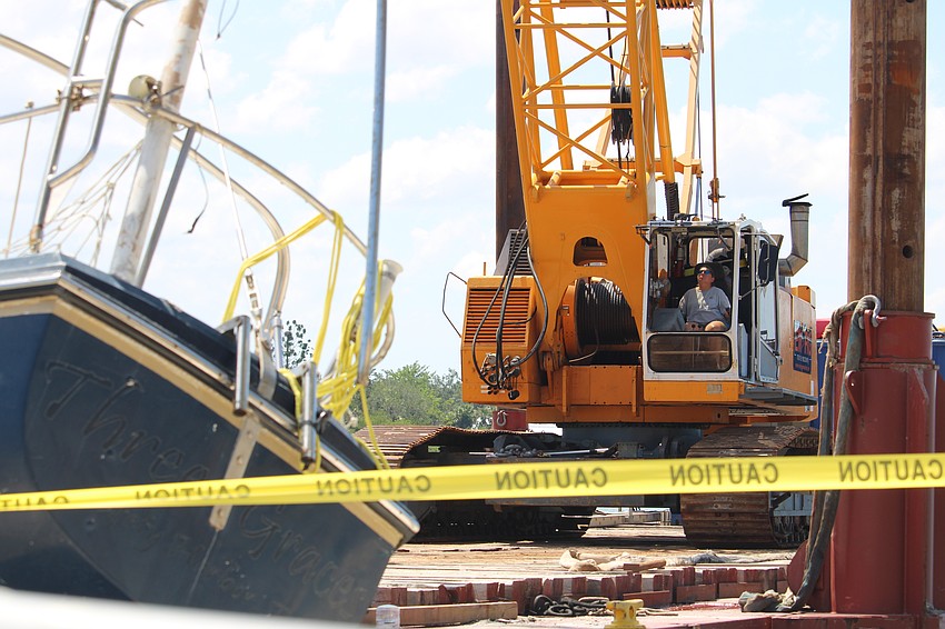 Removal crews busted out the heavy machinery to remove a wrecked boat, one of the last physical reminders of the damage caused by hurricanes Milton and Helene.