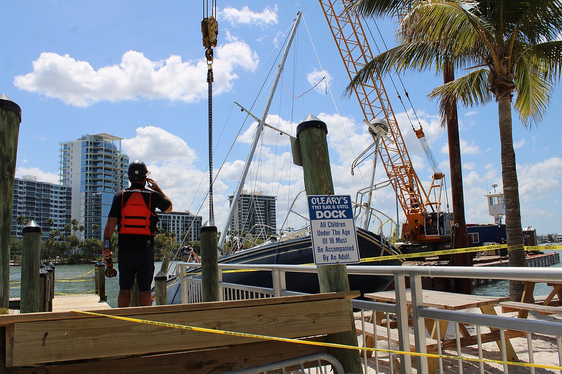 Friday marked the day O'Leary's Tiki Bar & Grill bid farewell to the boat washed up on its dock and celebrated its reopening.