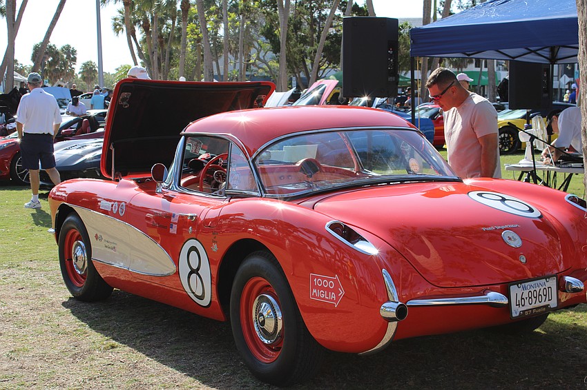 Onlookers checked out unique rides at Corvettes on the Circle, including this 1957 