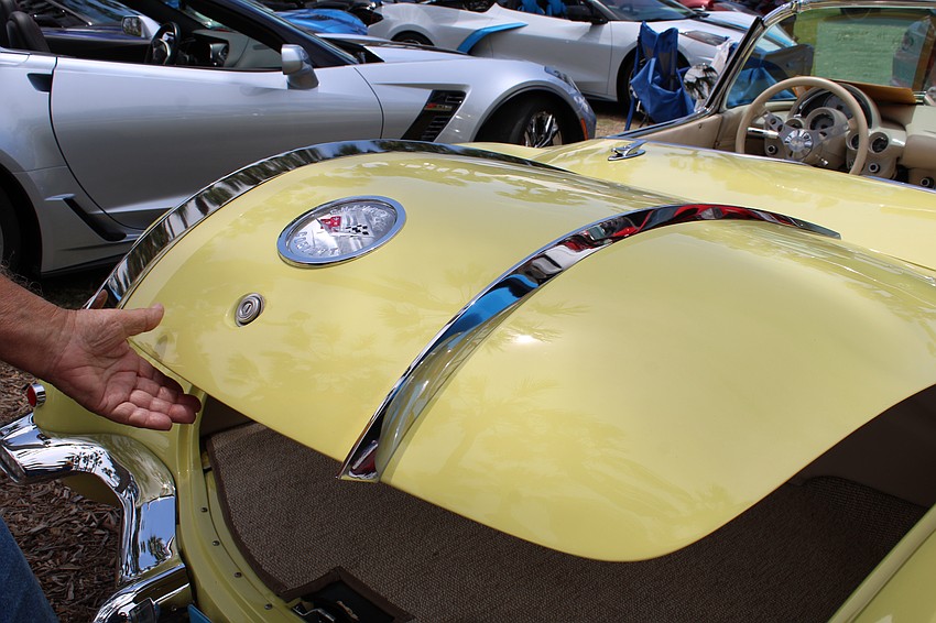 Joseph Russo shows off the characteristic chrome elephant tusks on his 1958 Panama Yellow Restomod.
