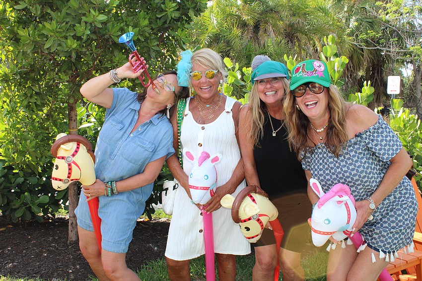 Debbie Coulter, Beth Otto, Jana Pendery and Terri Guthier get in the Kentucky Derby spirit on Saturday at Lo' Key Island Grille.
