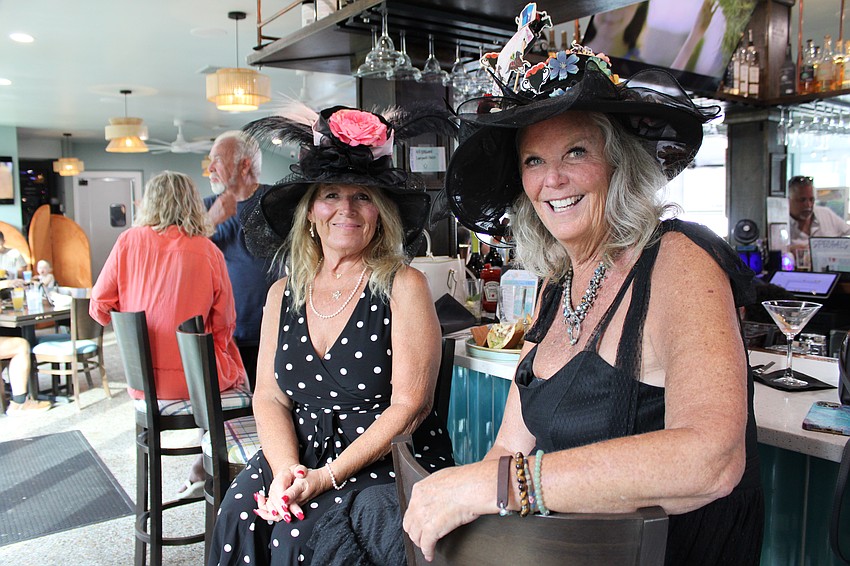 Sisters-in-law Kathy and Patrice Fanning dress to impress for the Kentucky Derby watch party. Patrice won the 