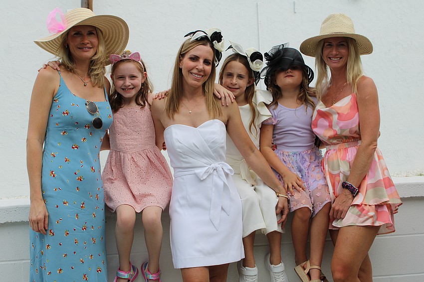 Emily Tiles, Sophia Acerb, Andrea Santiano, Madison Santiano, Rachel Tritschler and Brynleigh Tritschler don hats and frocks for Kentucky Derby Day.