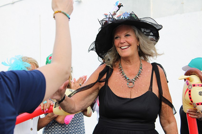Patrice Fanning wins the prize for best hat at the Kentucky Derby watch party.