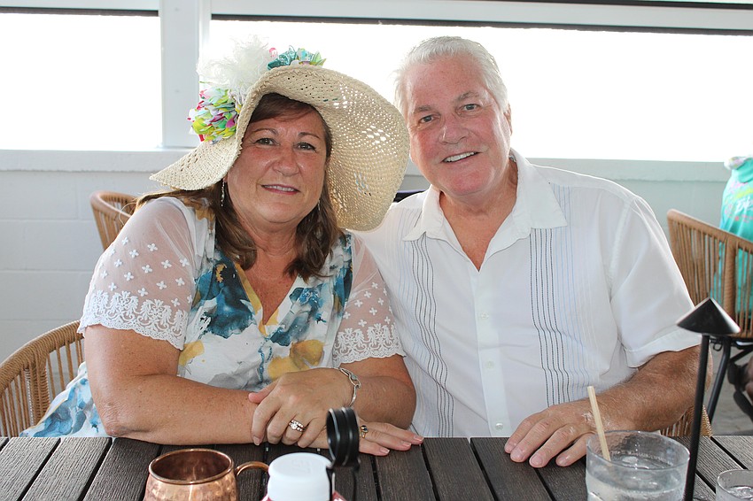 Carole and Robert Schaller decided on a whim to come out and enjoy the race. Carole joined the hat contest with a flower-adorned sunhat she decorated herself, and they almost correctly predicted the Kentucky Derby winner, with Journalism coming in second place.