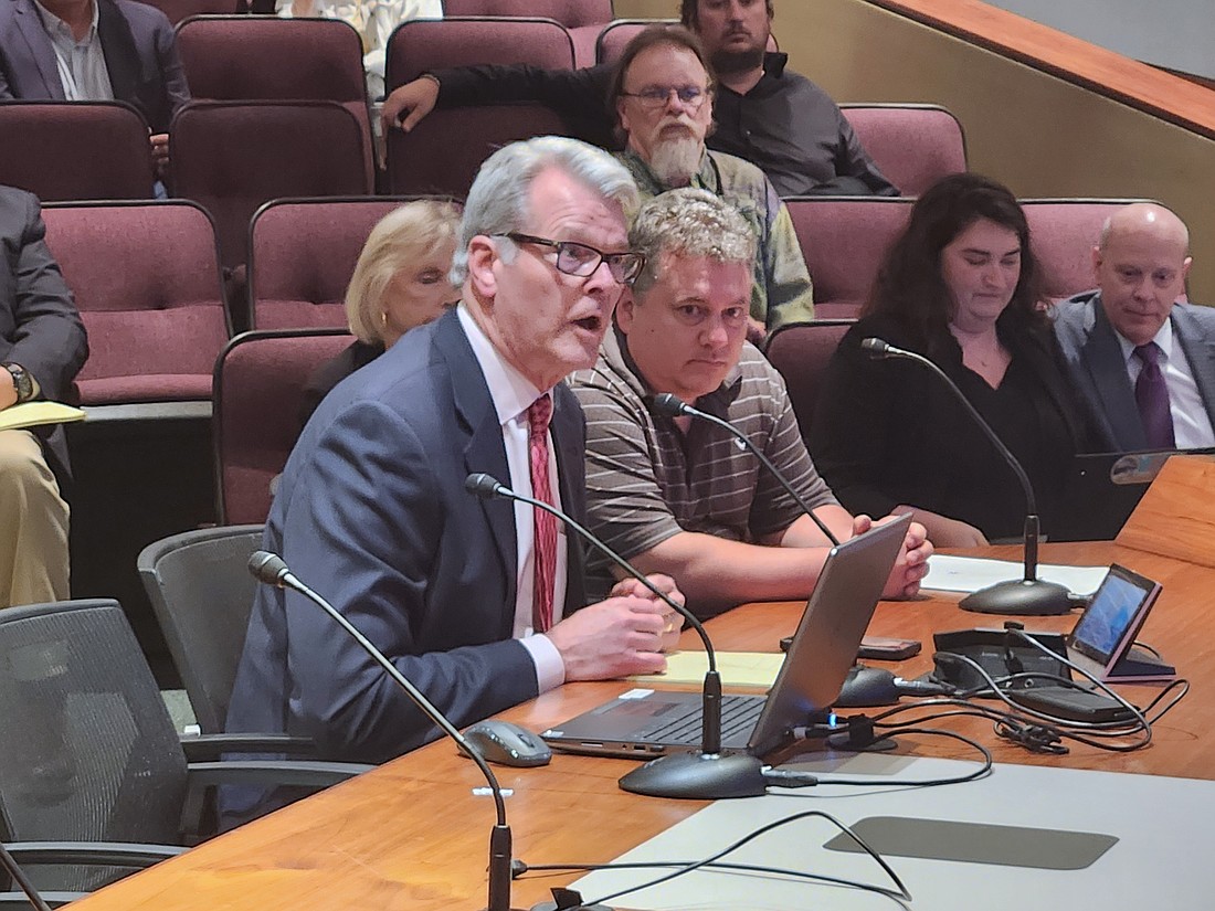 Attorney Bill Merrill addresses the Sarasota Planning Board with developer SS Sasquatch principal Paxton Kinol during a hearing about Sarasota Station.