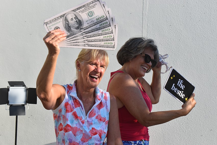 Donna Parks of Lakewood Ranch and Theresa Bing of Sarasota stumbled upon the Cinco de Mayo event after they walked four miles around the lake during a workout.