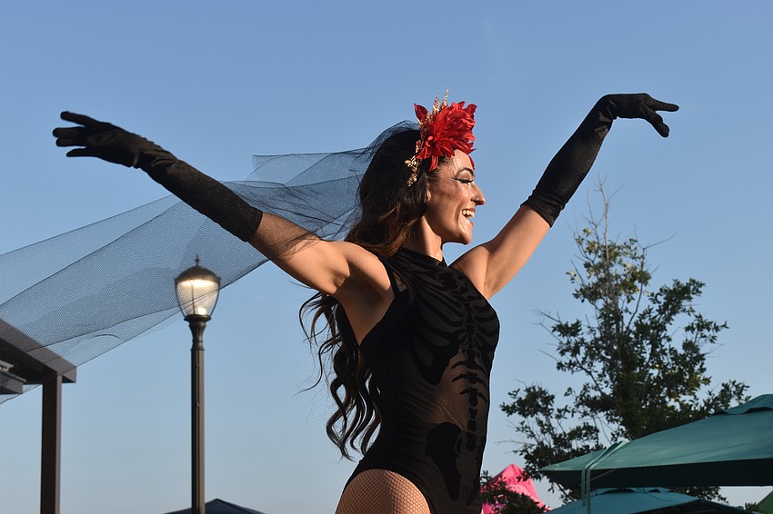 Tampa resident and stilt walker Natasha Eriksen performs on Cinco de Mayo at Agave Bandido.