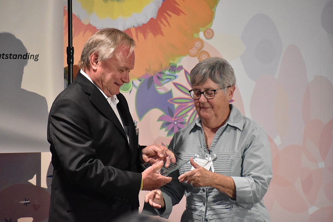David Baber presents an award to Dorothy Korwek.