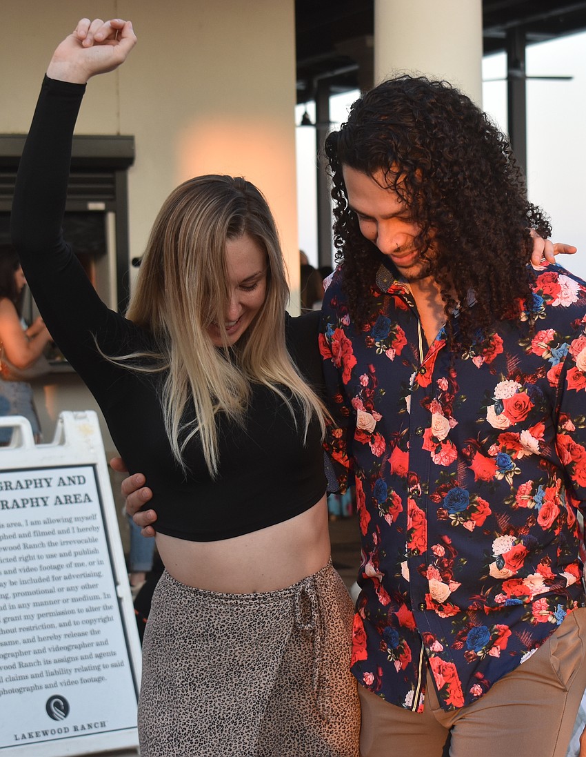 Nicolette Fornasari and Zavio Javier, both of Dance Fever Sarasota, show off their dance moves including salsa, bachata and the Argentine tango.