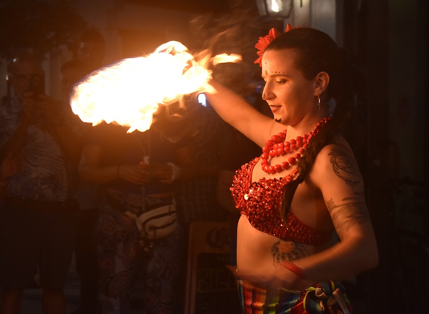 Fire performer Gaby Rosa, who performs at the Agave Bandido Cinco de Mayo celebration, says she started playing with fire in college.