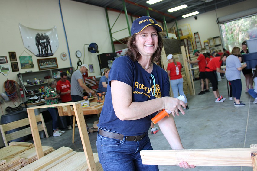 Laura Adcock, a principal and architect of WBRC, says the Rotary Club of Lakewood Ranch was invited to participate in the Red Day volunteer effort so she was happy to oblige.