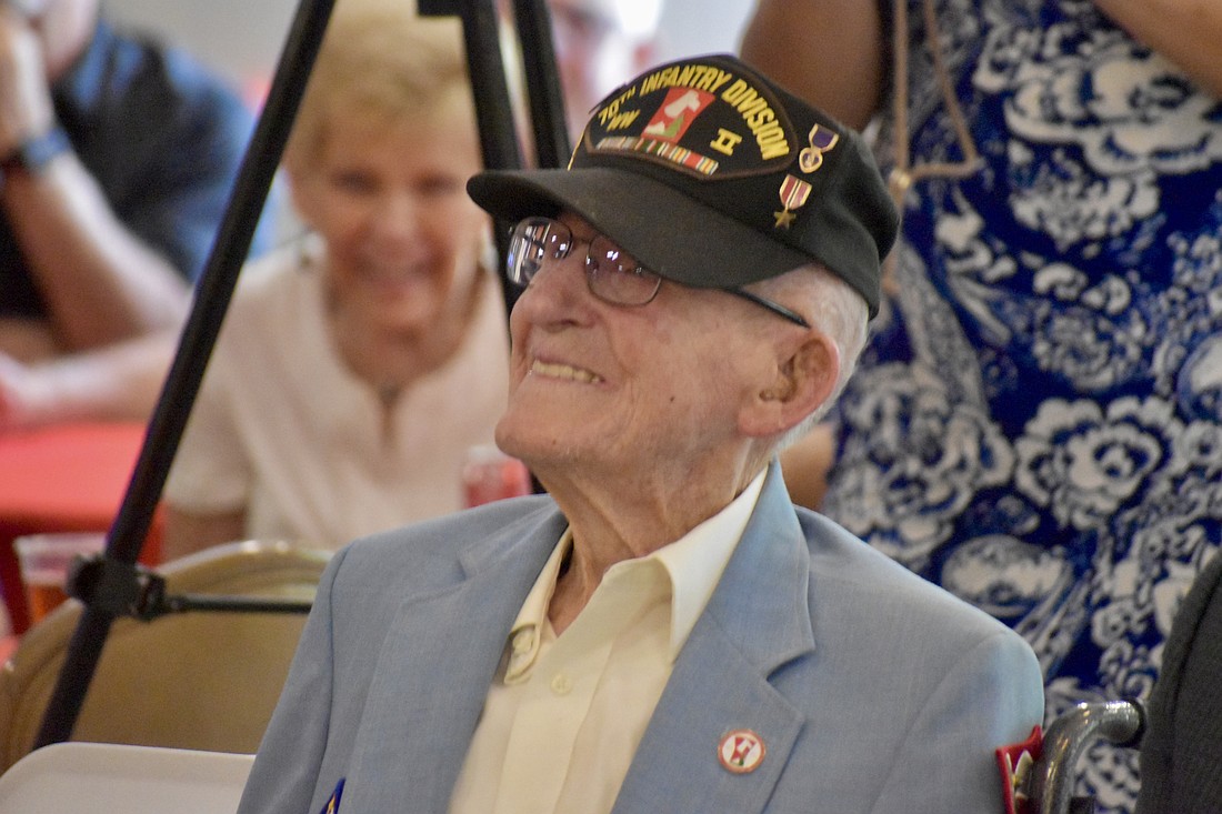Platoon Sgt. John Skeen is honored at the Elks Lodge in Lakewood Ranch May 8 on Victory in Europe Day.