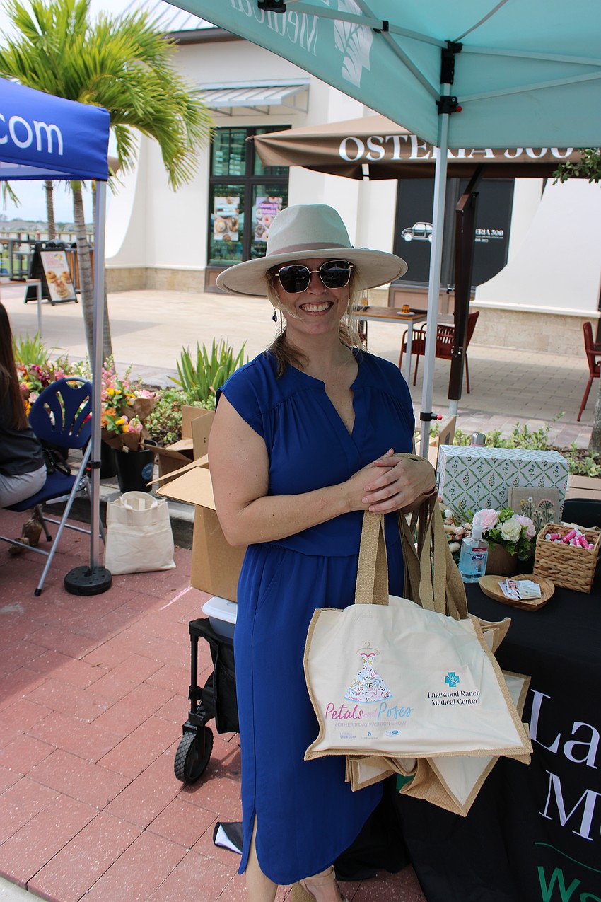 Christine Coney, the birth designer at Lakewood Ranch Medical Center, was handing out gifts to moms who visited the hospital's booth during the Mother's Day event May 10 at Waterside Place.