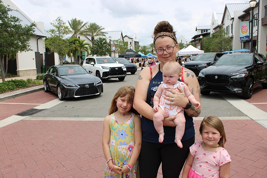 Sarasota's Donna Hendricks was loving the Mother's Day Event at Waterside Place even though she has her hands full with her children, 8-year-old Darla, 3-month-old Delilah, and 3-year-old Julia.