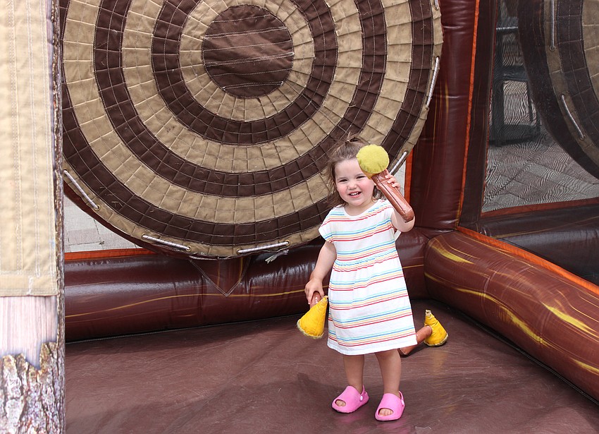 It might be a day to celebrate mothers, but Lakewood Ranch 2-year-old Josie Hillier was having plenty of fun herself at Waterside Place in the Kids Zone.