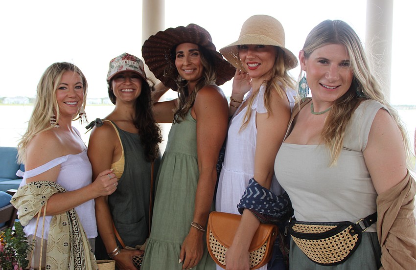 Brittany Fordham, Brittney Jolin, Nicole Houser, Audriana Vandenoever and Natalia Tkacz modeled outfits for La Chíc Bohème of Lakewood Ranch during the Petals and Poses Fashion Show May 10 at Waterside Place.