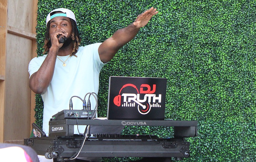 DJ Truth handled the entertainment during Petals and Poses May 10 at Waterside Place.